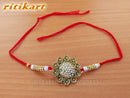 Golden Color flower design Rakhi with white stone