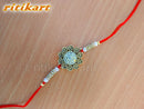 Golden Color flower design Rakhi with white stone