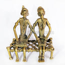 Tribal Couple Sitting on Charpai Dhokra Art Showpiece