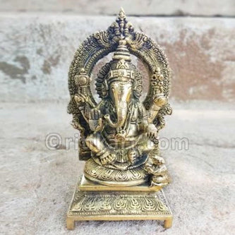 Brass Statue Sitting Lord Ganesh pic