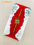 Golden Omm inside Metal Swastik Rakhi