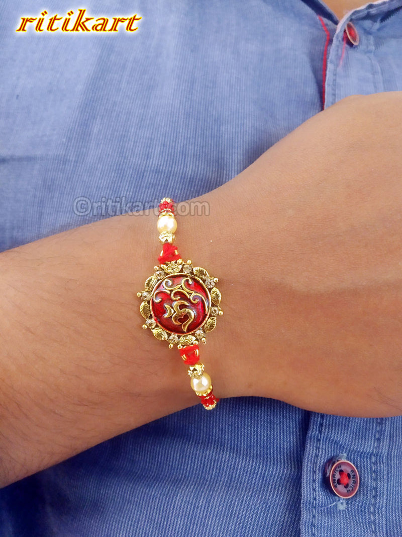 Religious Omm Rakhi with Red and Golden Beads