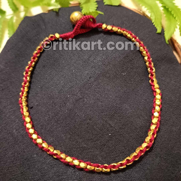 Embedded Brass Beads in Red Thread