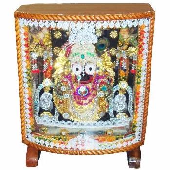 Jagannath Idol in wooden box with colourful lighting