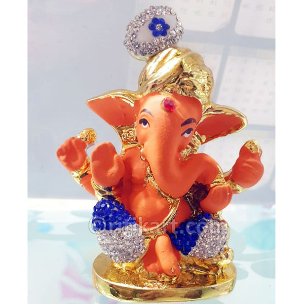 Lord Ganesha sitting on Dias Alloy Metal Showpiece